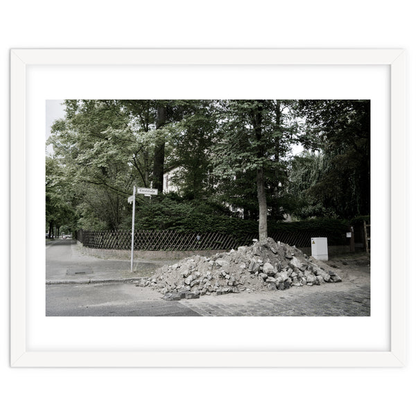 Piled-up rocks under construction on the street