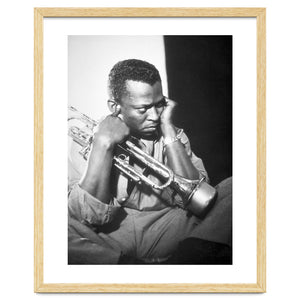 Jazz trumpeter Miles Davis early in his career playing in New York City, circa 1955. by Album