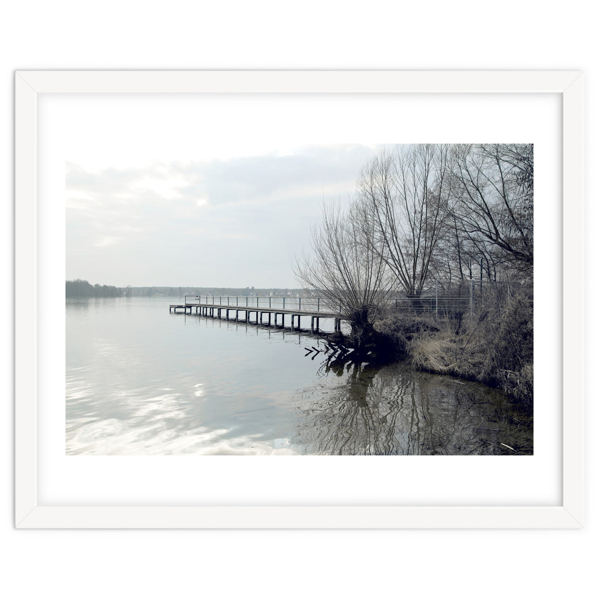 Sunny day pier in the lake
