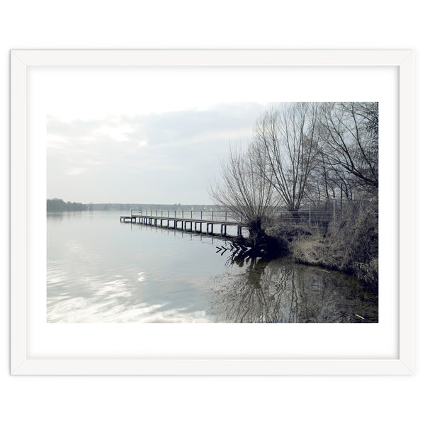 Sunny day pier in the lake