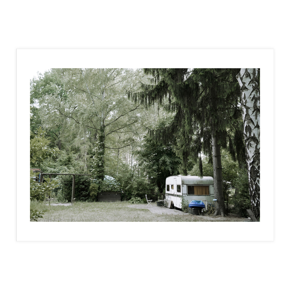 Travel trailer in the green garden (Print Only)
