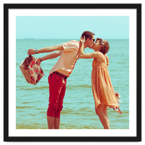 Romantic kiss - Lovely couple at the beach - Vintage filtered by Julien