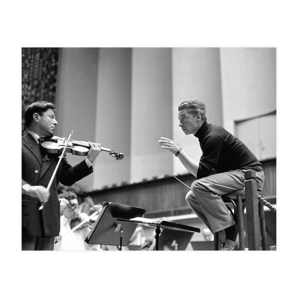 Conductor Herbert von Karajan rehearsing with Nathan Milstein in Lucerne, Switzerland. Lucerne,1957. (Print Only)