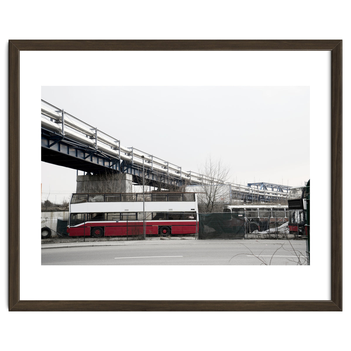 Abandoned Bus under the rail bridge