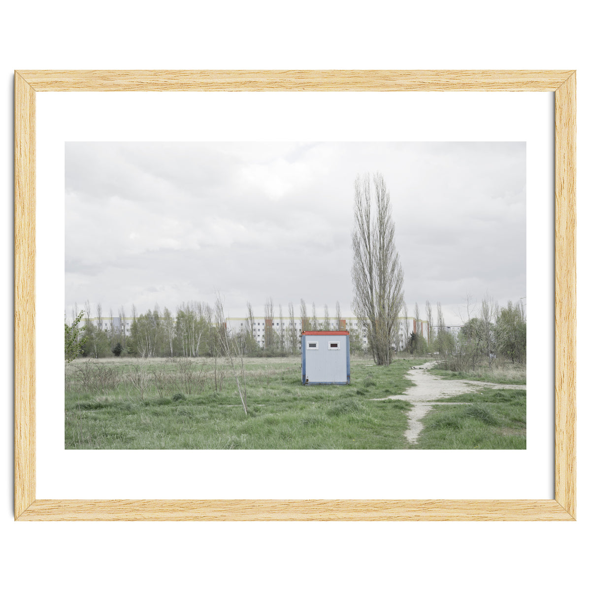 Hut in the middle of green field