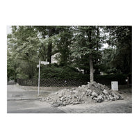 Piled-up rocks under construction on the street (Print Only)
