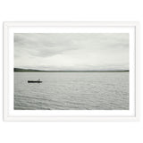 A boy pedaling the Board on the Lake - Iceland thumbnail
