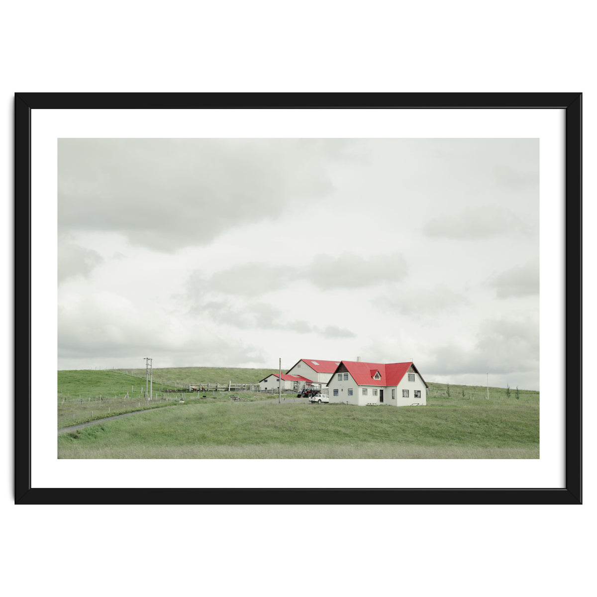 Red roof house on the green hill - Iceland
