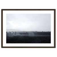 Tourists on the black sand beach - Iceland