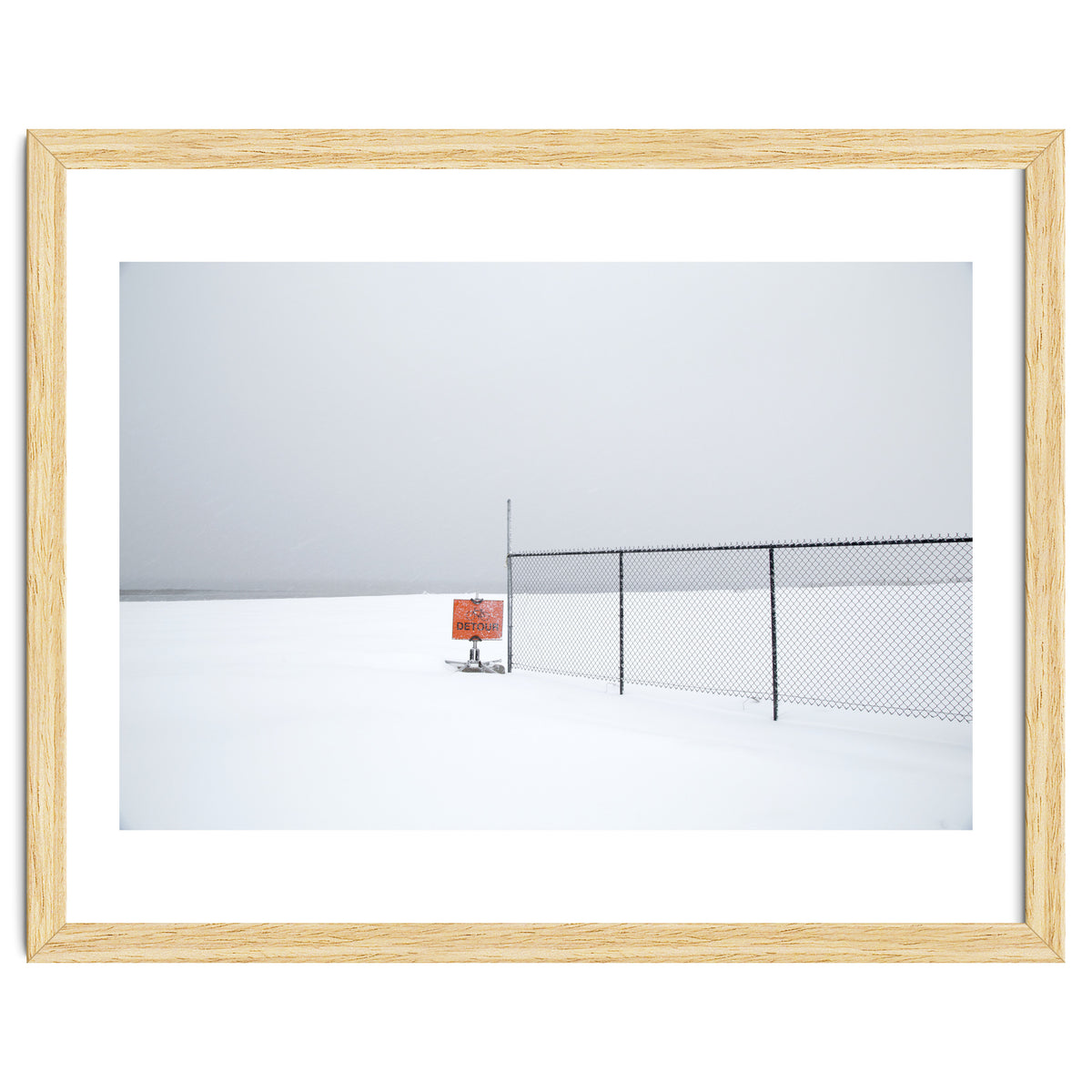 Detour sign in the snow beach