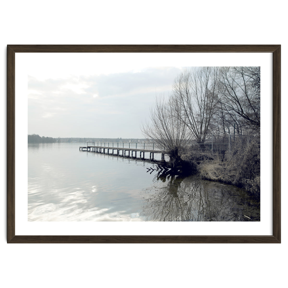 Sunny day pier in the lake