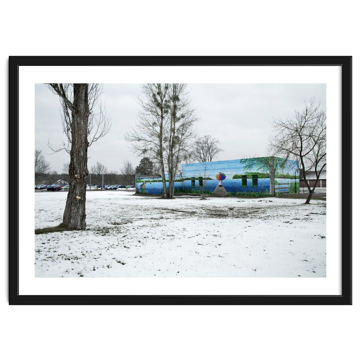 Colorful barn in the snowy ground landscape