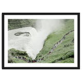 Tourists walking around the waterfall - Iceland thumbnail
