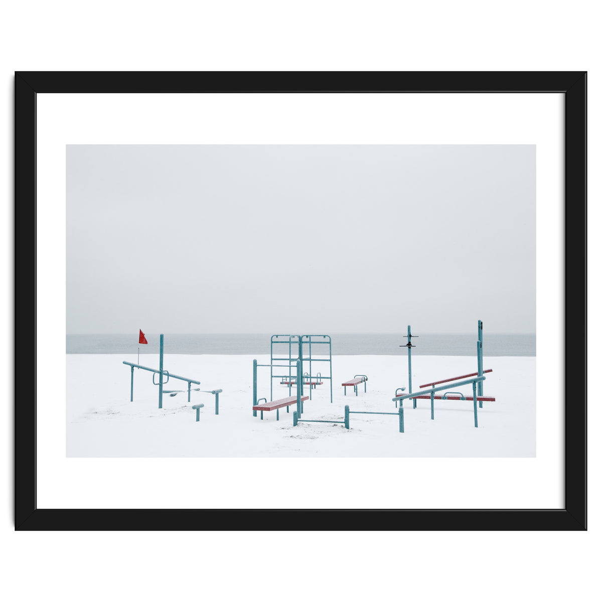 Playground in the winter snow beach