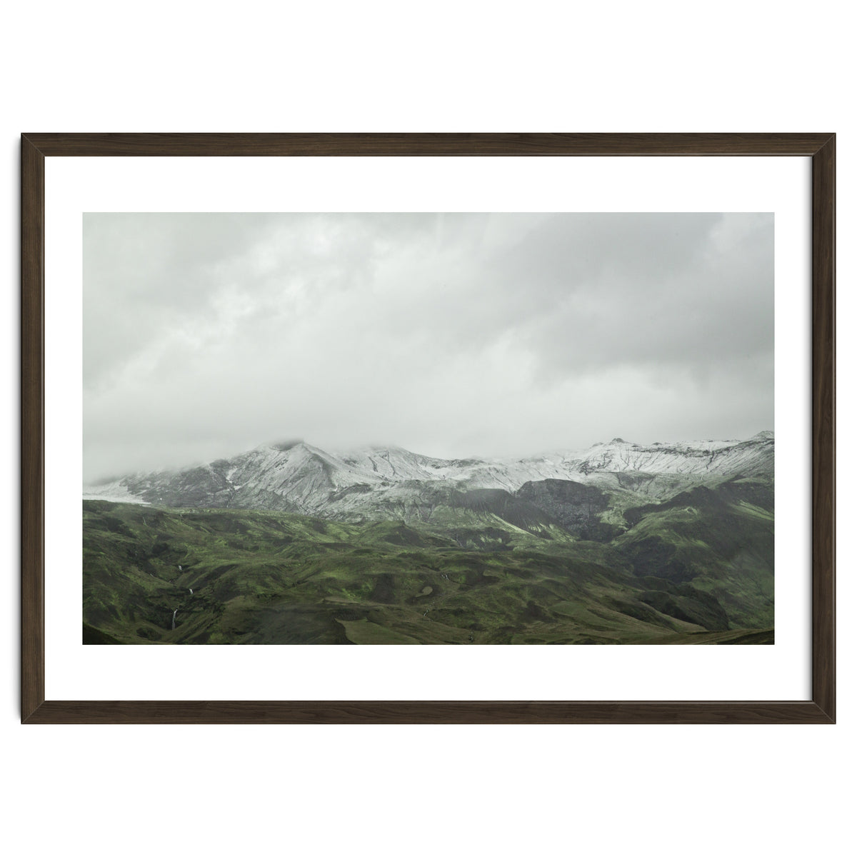 Snow-covered green mountains - Iceland