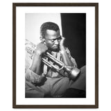 Jazz trumpeter Miles Davis early in his career playing in New York City, circa 1955. thumbnail