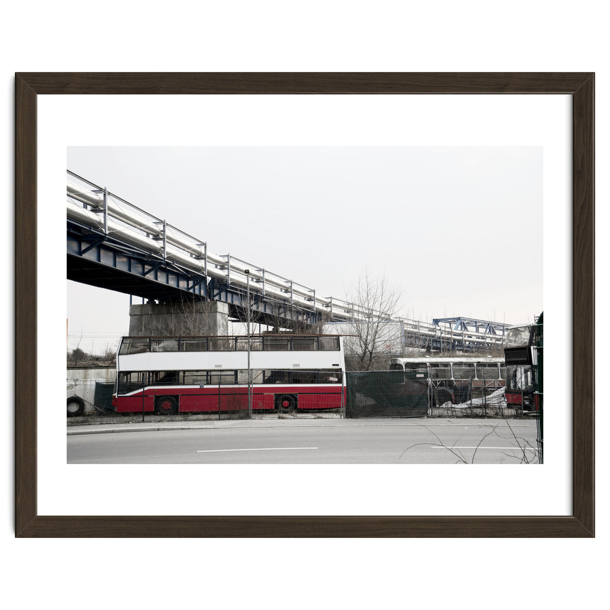 Abandoned Bus under the rail bridge