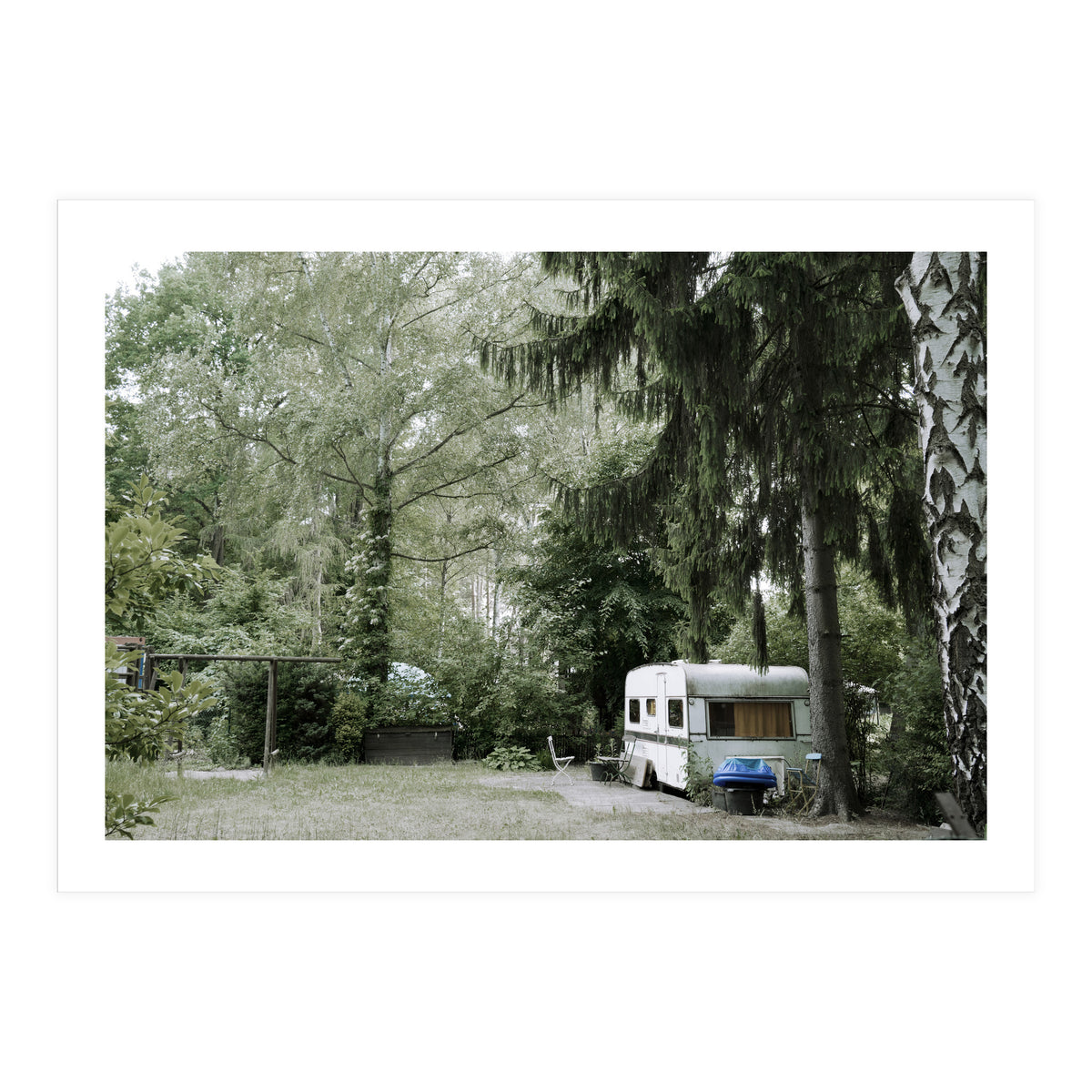Travel trailer in the green garden (Print Only)