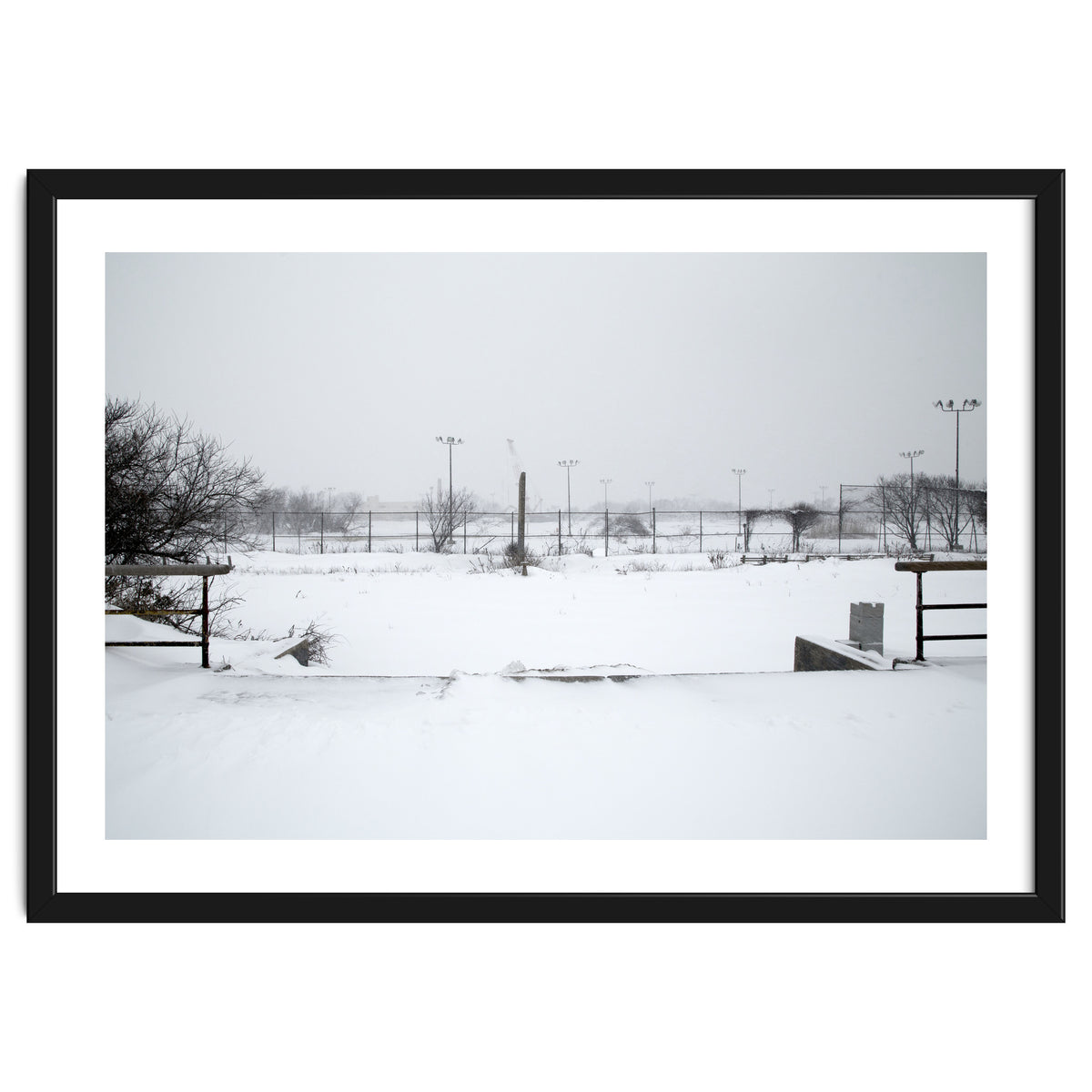 Baseball field covered in snow