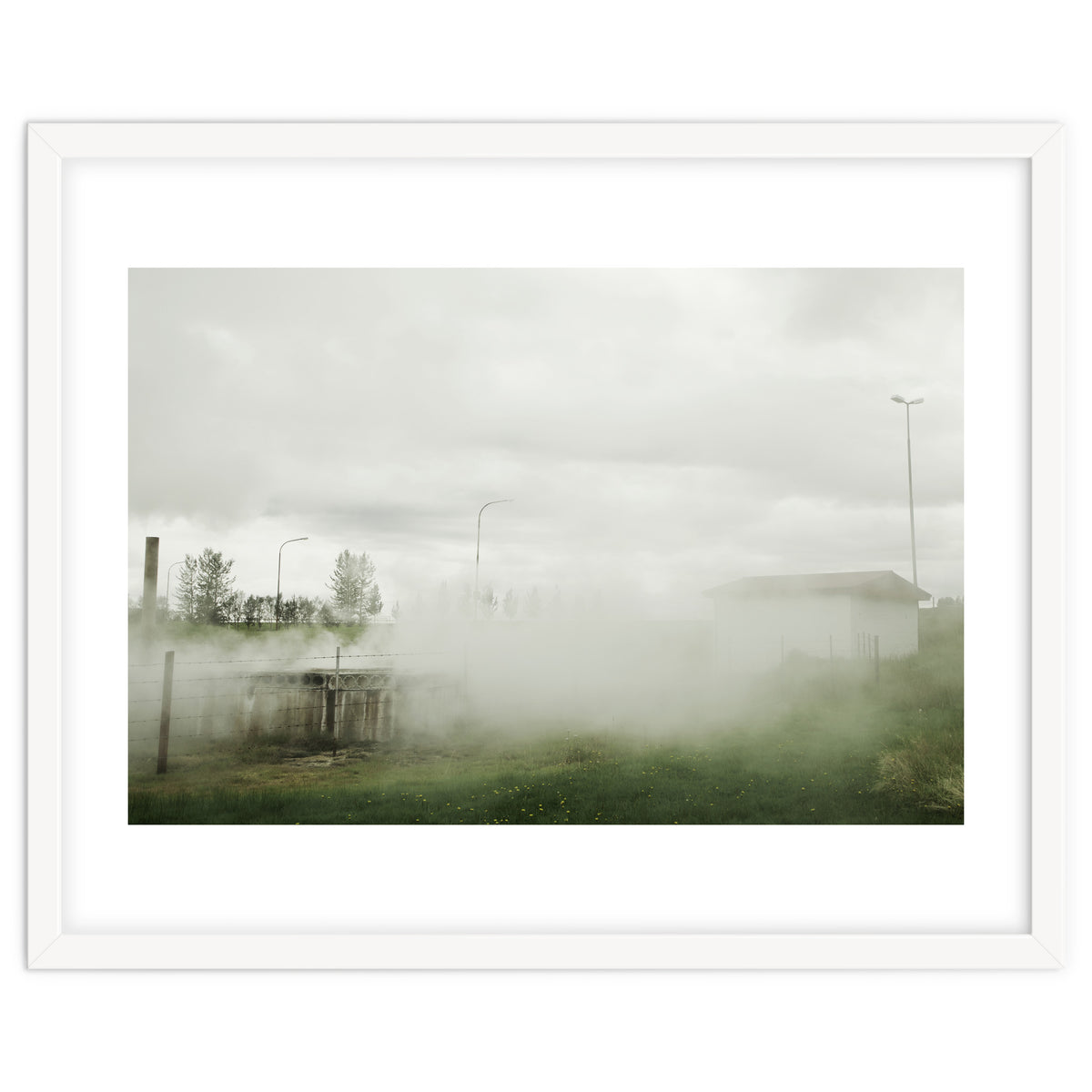 A source covered in steam from a hot spring - Iceland