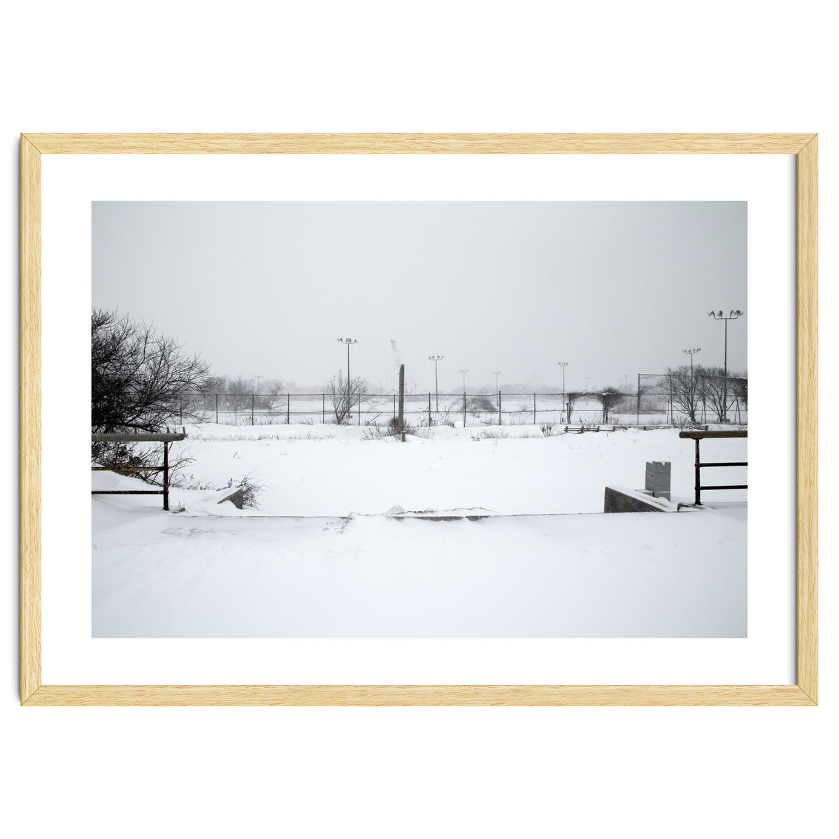 Baseball field covered in snow