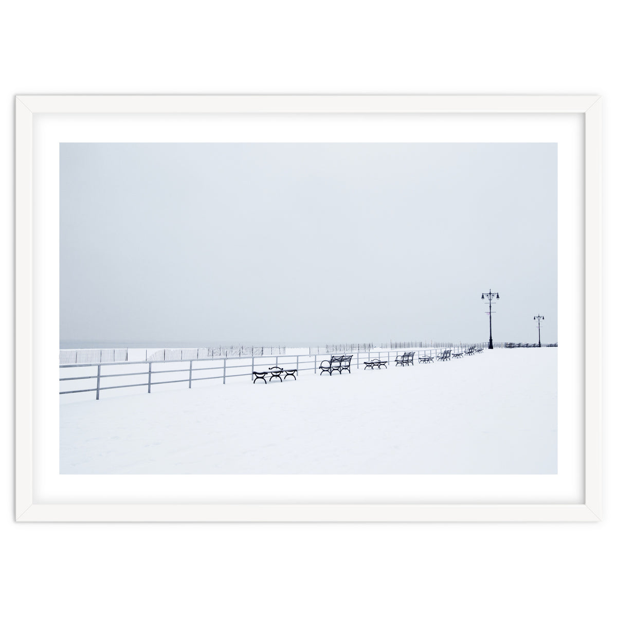 Benches along the pier on snow beach