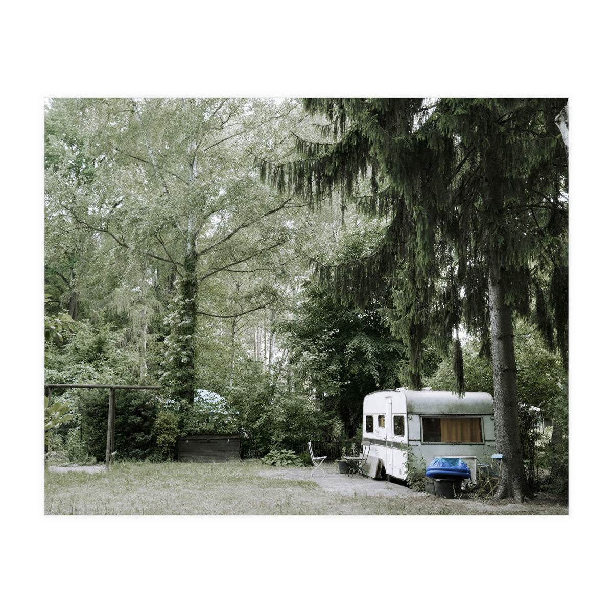 Travel trailer in the green garden (Print Only)