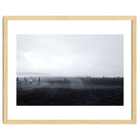 Tourists on the black sand beach - Iceland