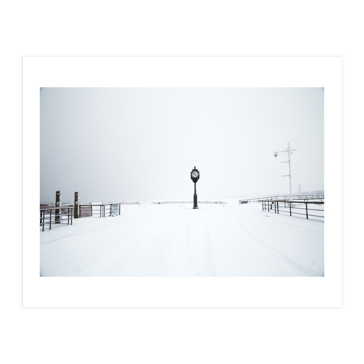 A clock tower in the snow beach (Print Only)