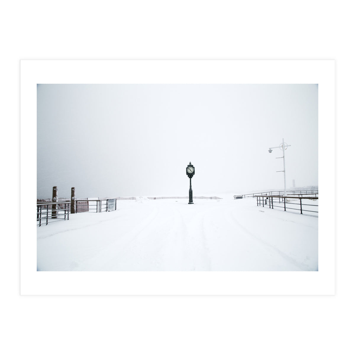 A clock tower in the snow beach (Print Only)