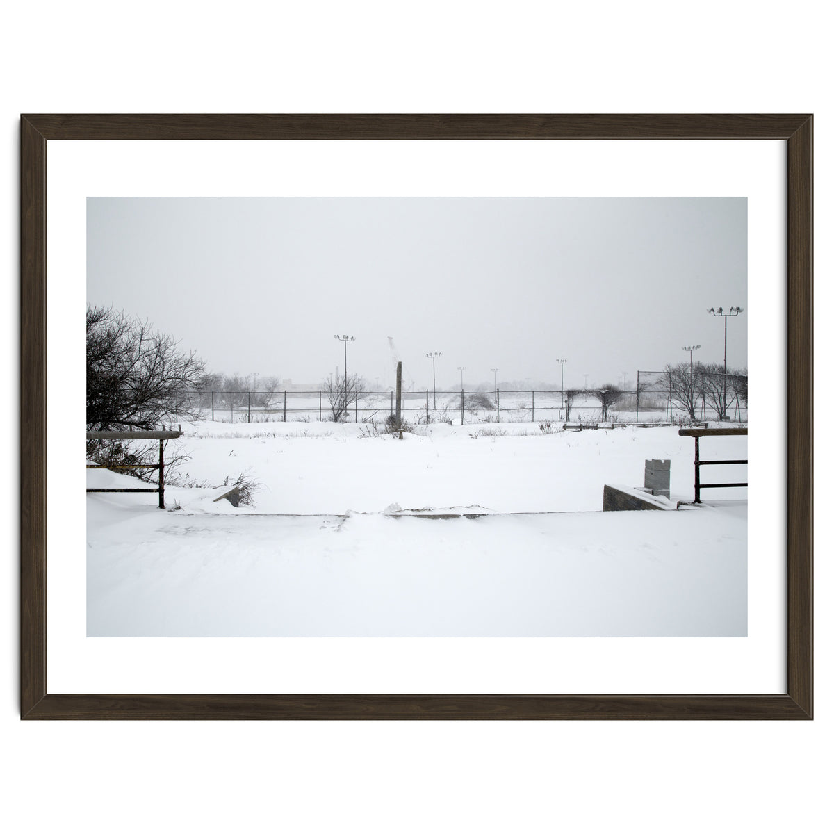 Baseball field covered in snow