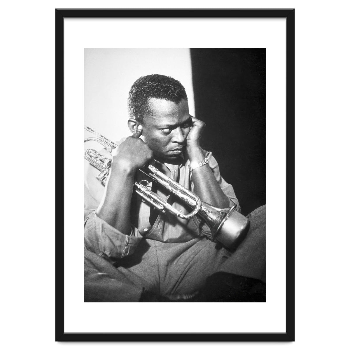 Jazz trumpeter Miles Davis early in his career playing in New York City, circa 1955.