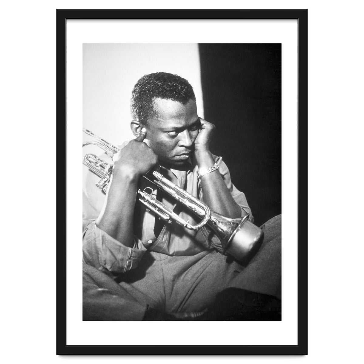 Jazz trumpeter Miles Davis early in his career playing in New York City, circa 1955.