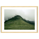Green mountain covered in clouds - Iceland thumbnail