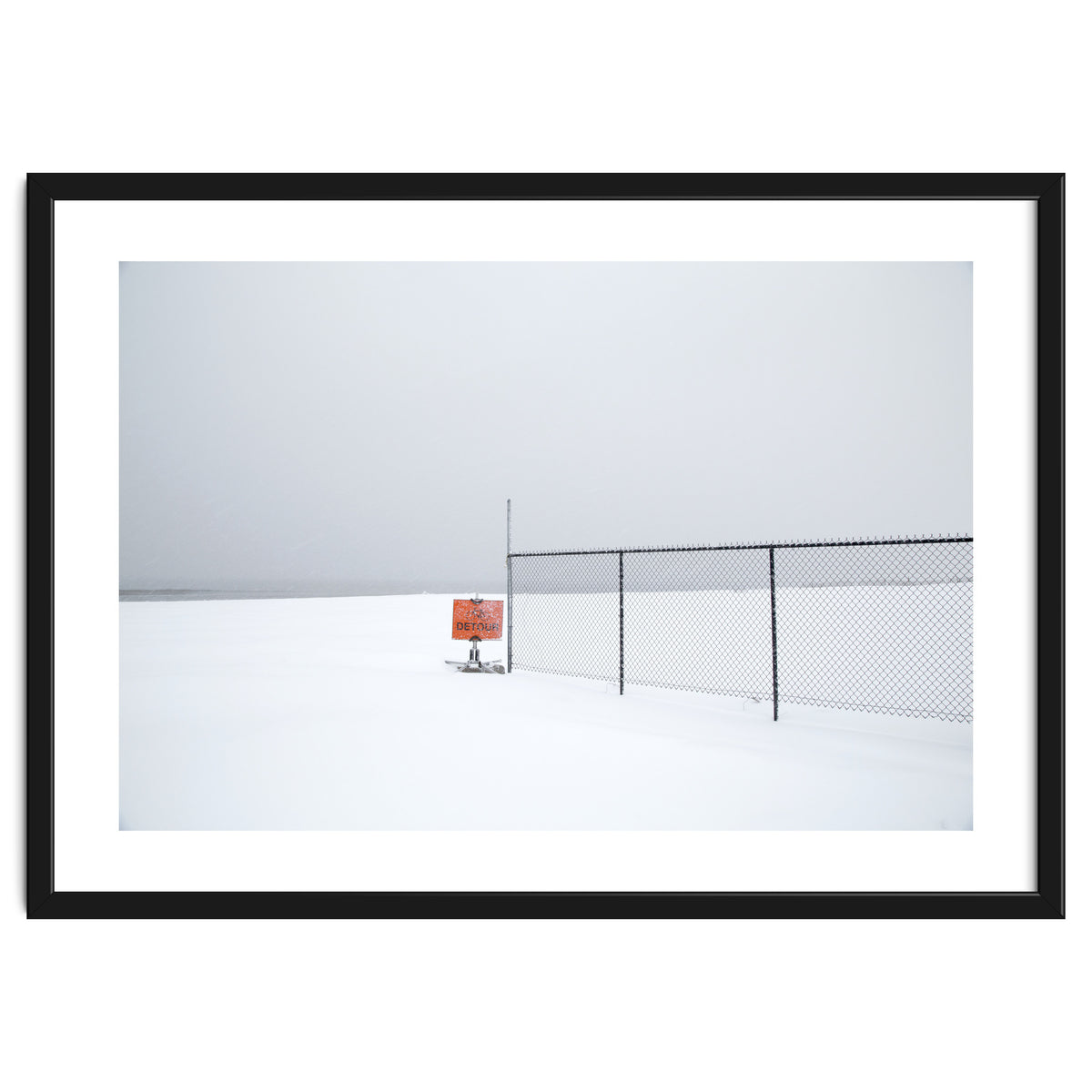 Detour sign in the snow beach