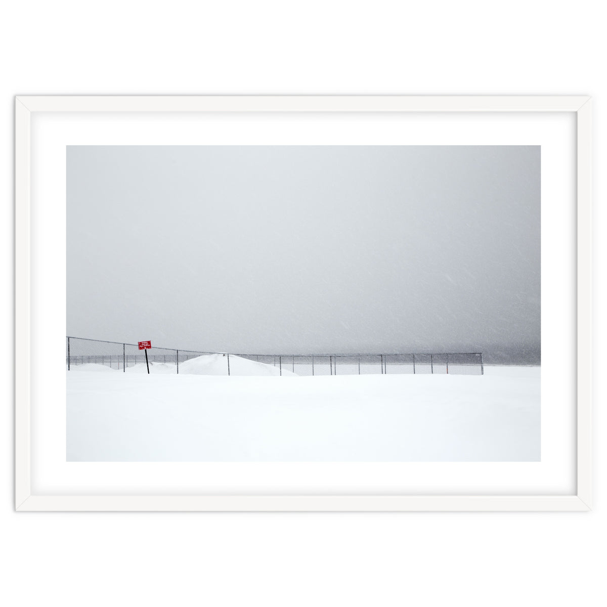 Fence in the winter seascape