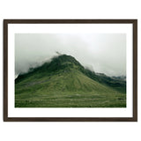 Green mountain covered in clouds - Iceland thumbnail