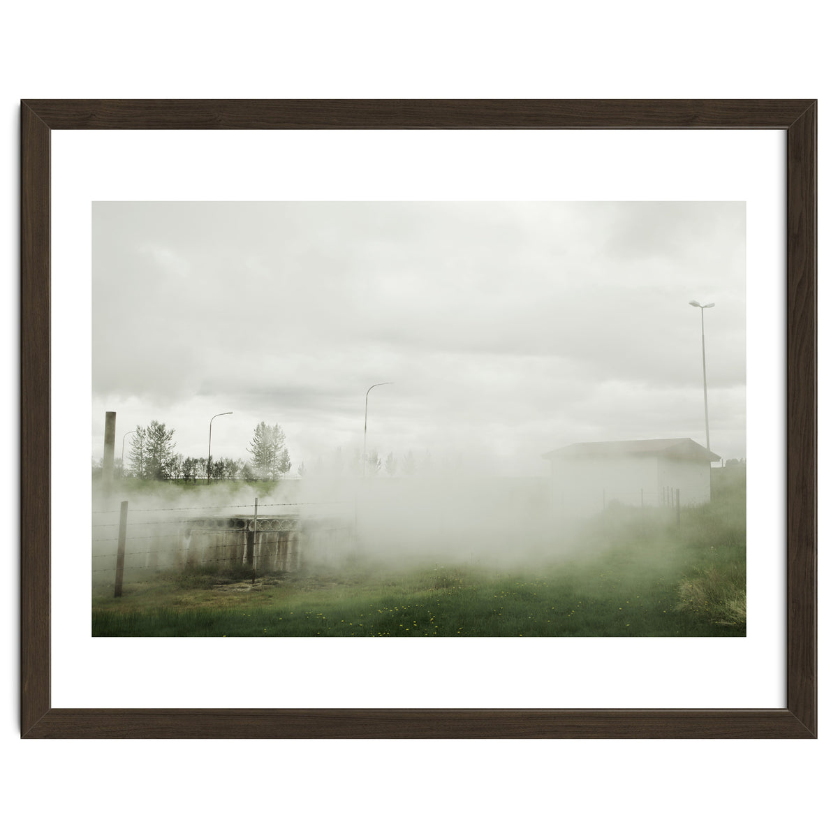 A source covered in steam from a hot spring - Iceland