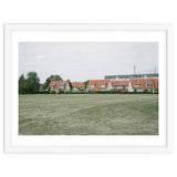 Red roof houses in the green field thumbnail