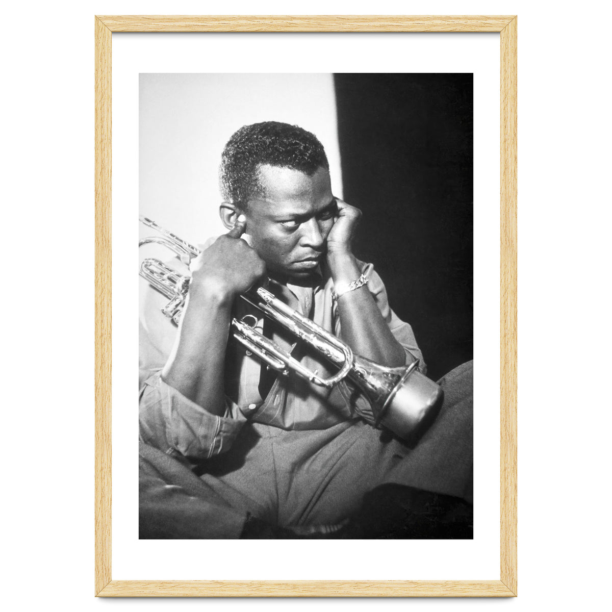 Jazz trumpeter Miles Davis early in his career playing in New York City, circa 1955.