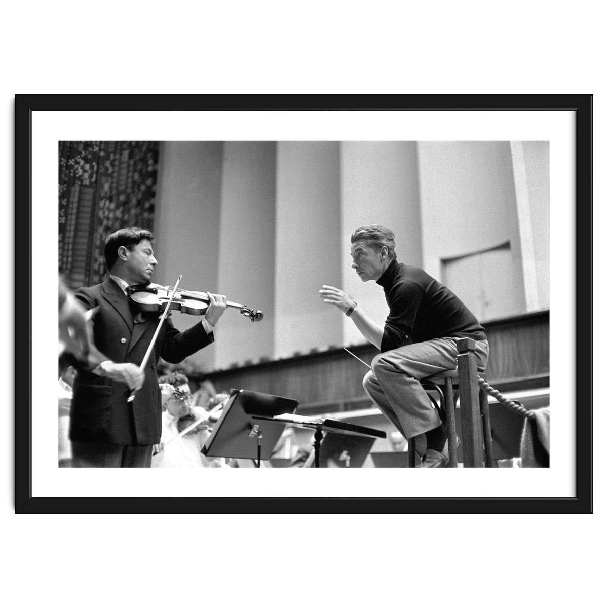Conductor Herbert von Karajan rehearsing with Nathan Milstein in Lucerne, Switzerland. Lucerne,1957.