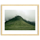 Green mountain covered in clouds - Iceland thumbnail