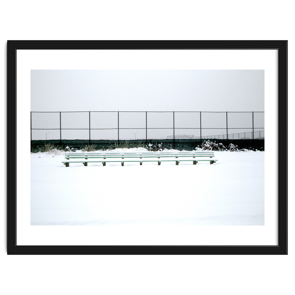 Bench with no people in snowy winter