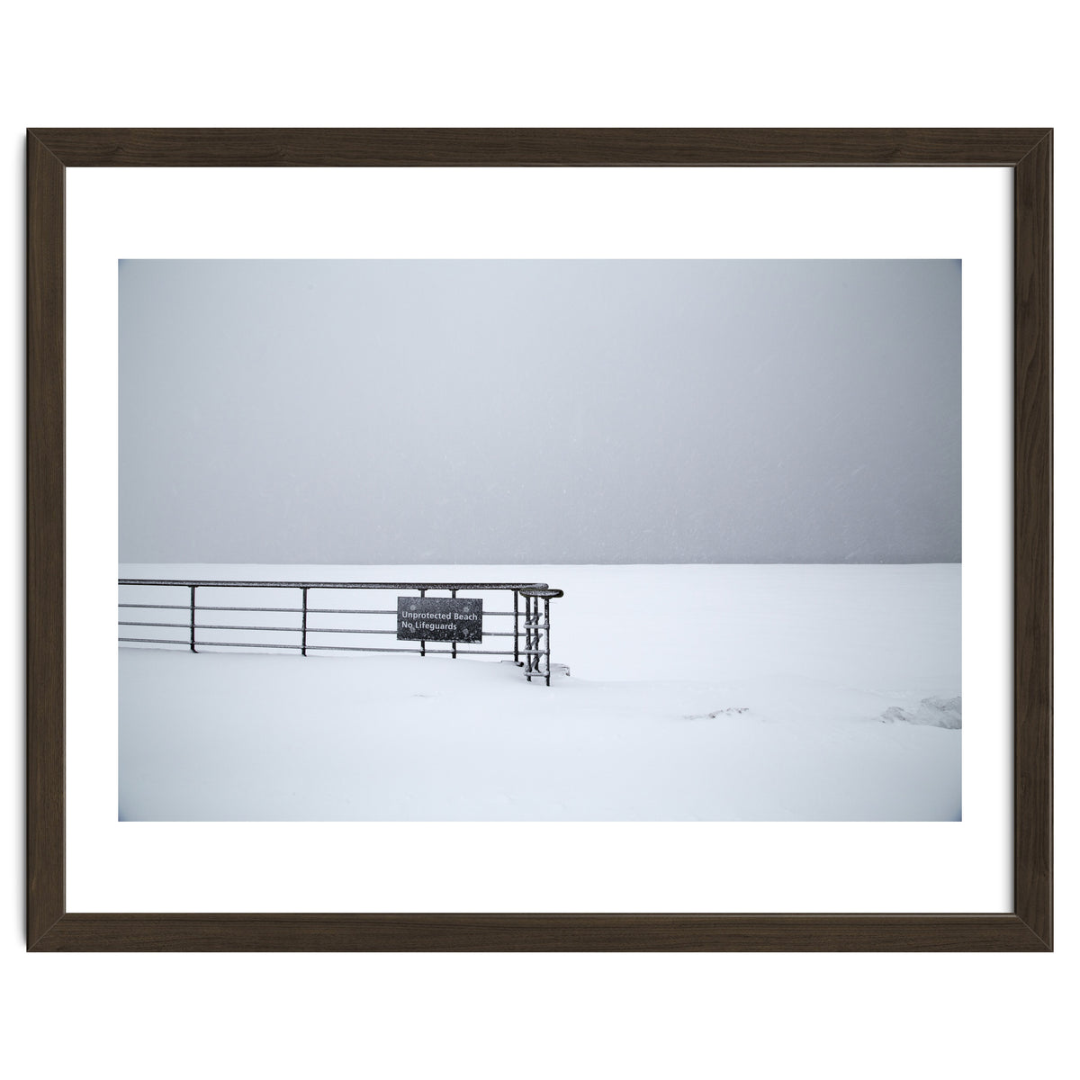 No lifeguards on the sign board in the winter snow beach