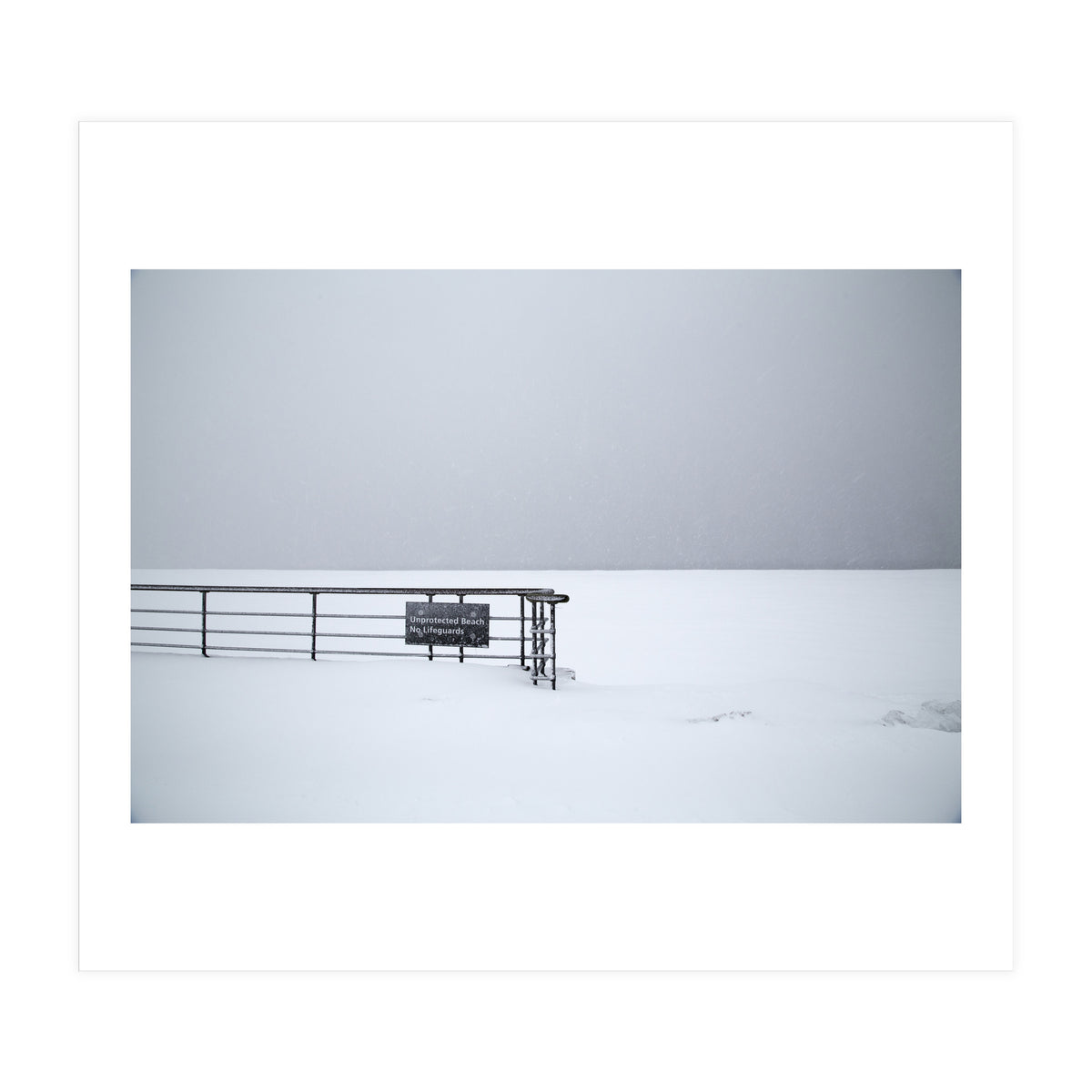 No lifeguards on the sign board in the winter snow beach (Print Only)