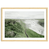 Tourists walking along the waterfall - Iceland thumbnail