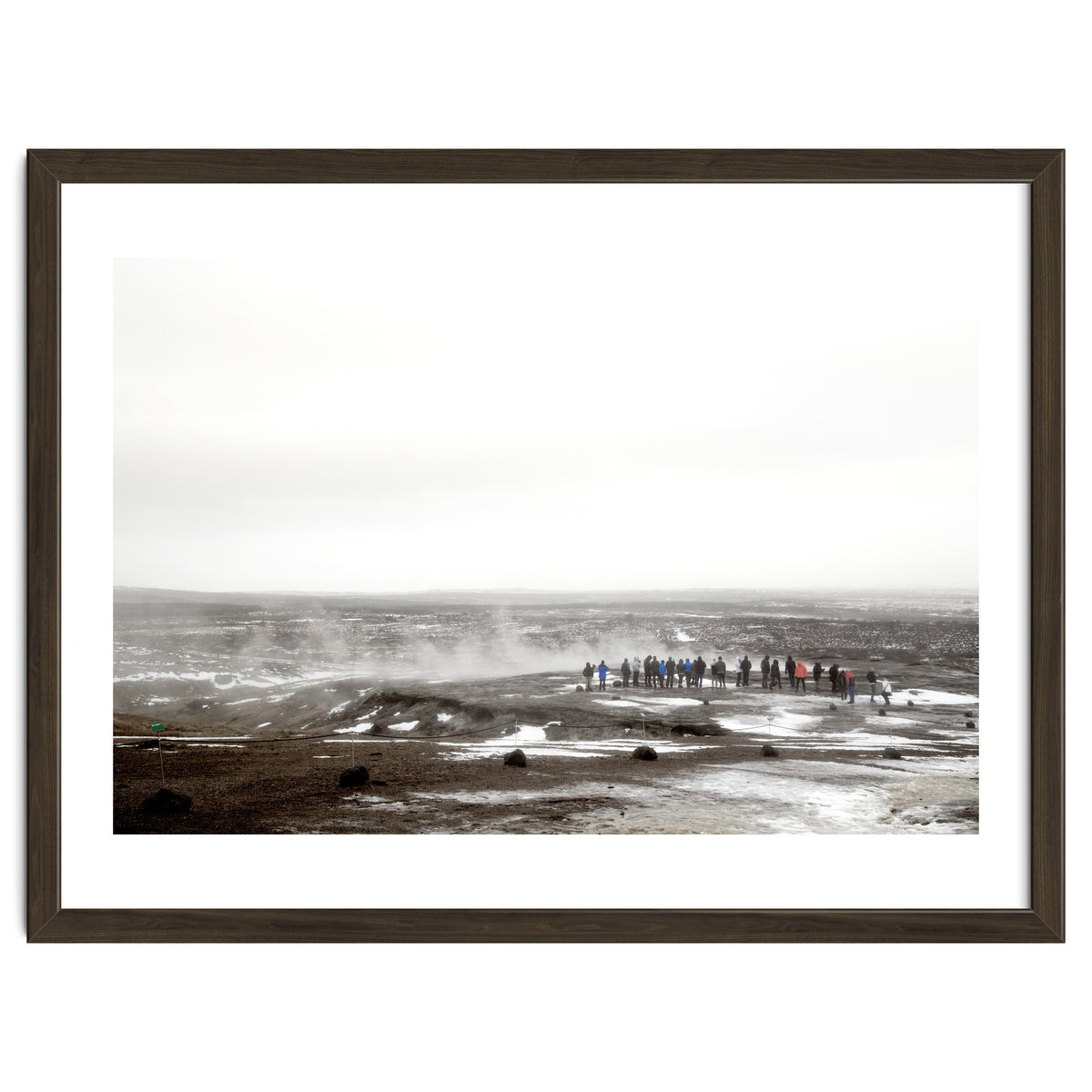 Tourists looking at the geyser - Iceland