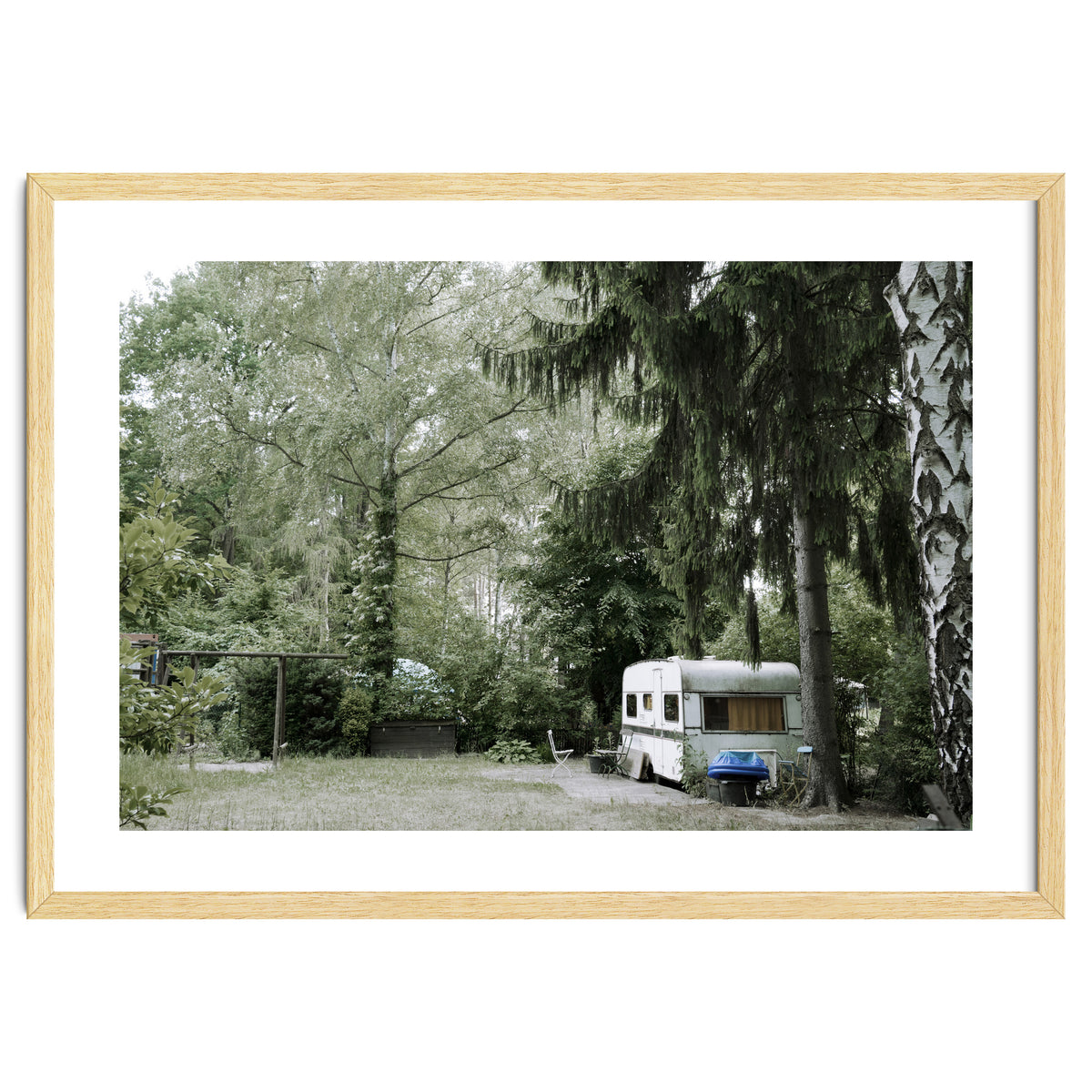 Travel trailer in the green garden