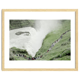 Tourists walking around the waterfall - Iceland thumbnail
