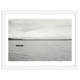 A boy pedaling the Board on the Lake - Iceland thumbnail